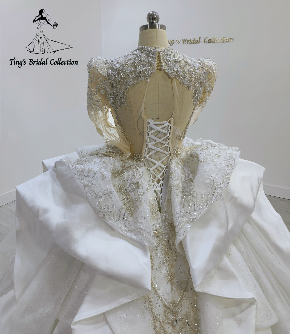 TBC-JB099 Custom-made luxury beading satin long sleeve royal wedding dress