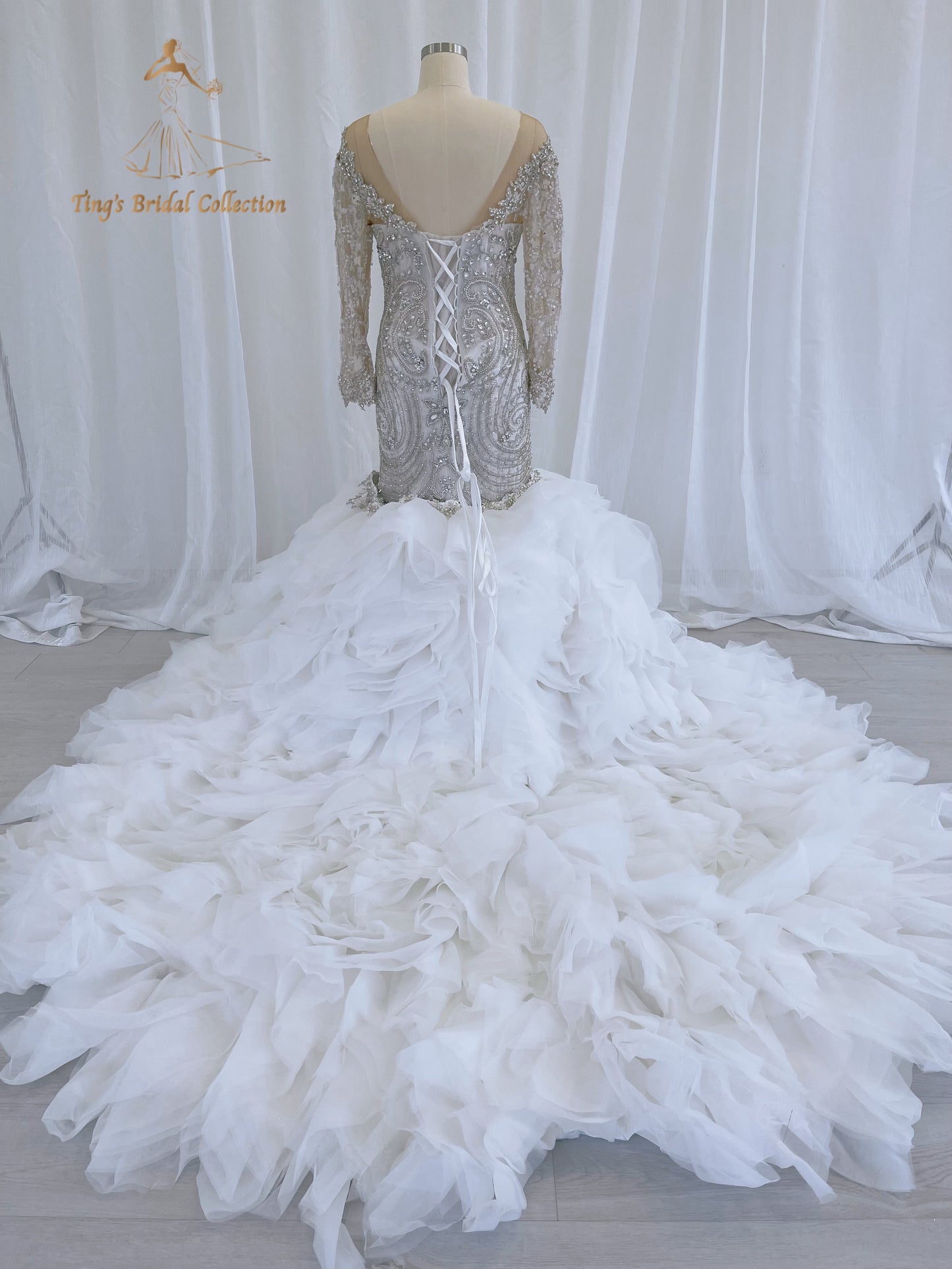 TBC-CM49 Custom-made fully crystal beaded long sleeve mermaid royal wedding dress with detachable ruffles skirt - Ting's Bridal Collection
