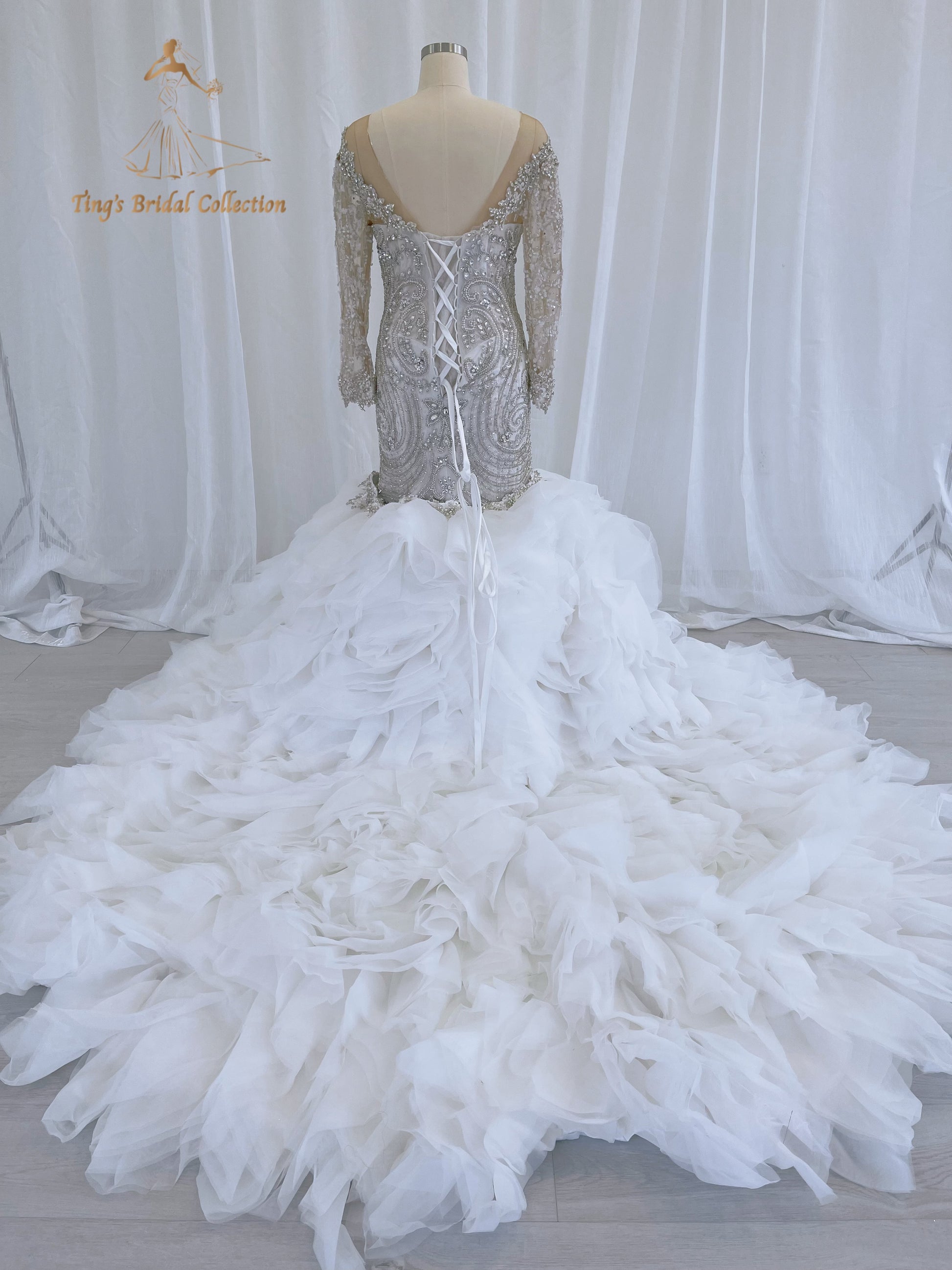 TBC-CM49 Custom-made fully crystal beaded long sleeve mermaid royal wedding dress with detachable ruffles skirt - Ting's Bridal Collection