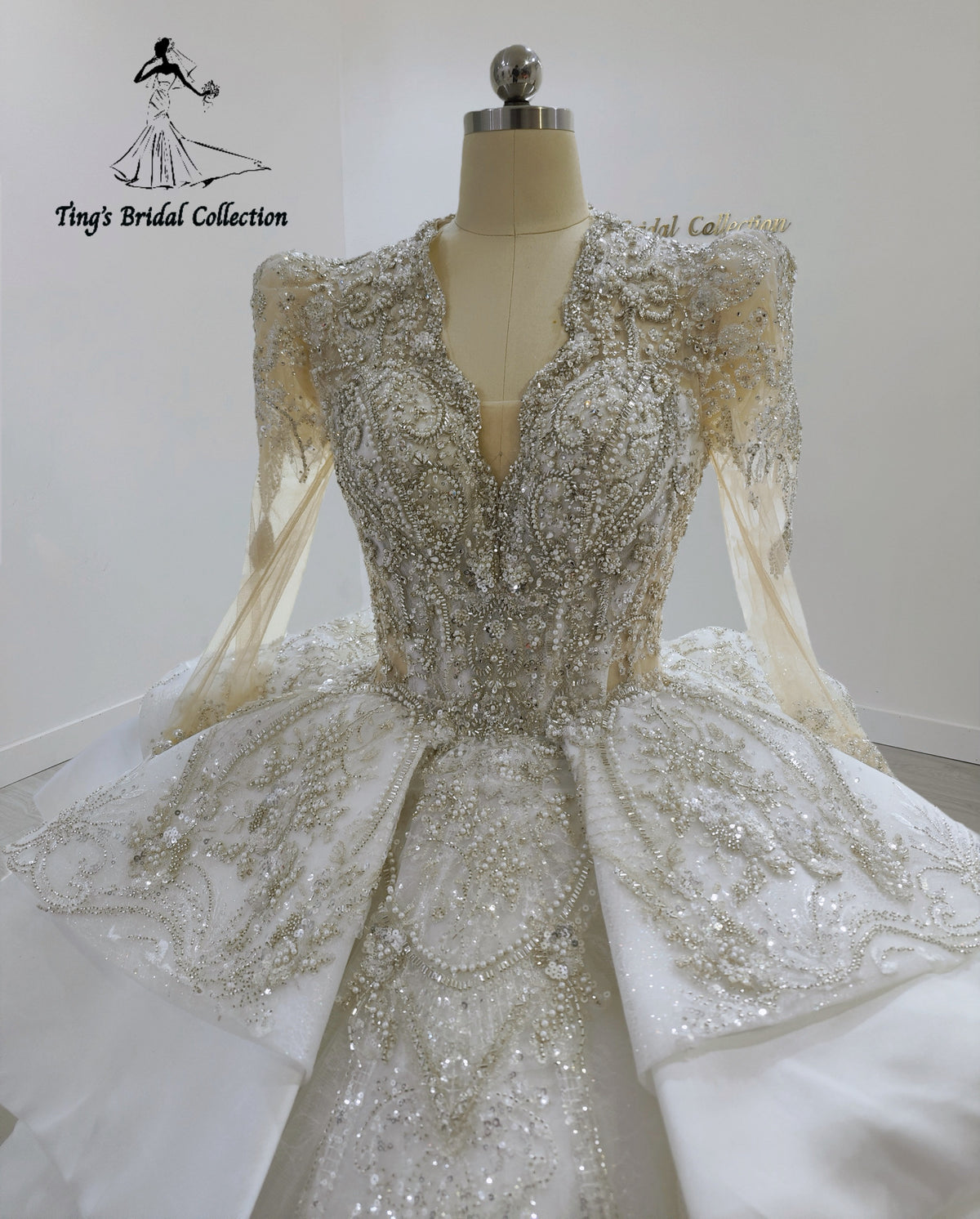 TBC-JB099 Custom-made luxury beading satin long sleeve royal wedding dress